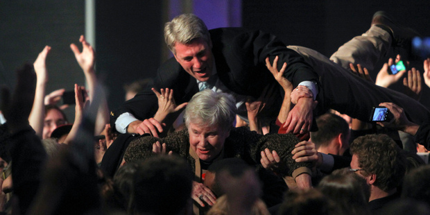 Minneapolis Mayor Rybak goes crowd surfing with his mother Loraine, after it was announced that President Barack Obama had won re-election. Photo / AP