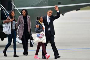 President Barack Obama with daughters Sasha, second from right, Malia, left, and first lady Michelle Obama. Photo / AP