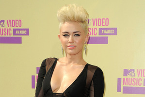 Miley Cyrus is engaged to Aussie actor Liam Hemsworth.Photo / AP