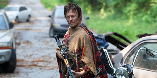 Daryl Dixon, played by Norman Reedus, gets ready for some zombie action in The Walking Dead. Photo / Supplied