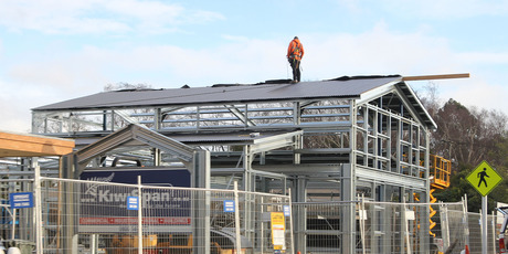 A new shop being built in Christchurch. A lift in labour pay rates in Canterbury pushed up national figures released by Statistics NZ today. Photo / Geoff Sloan