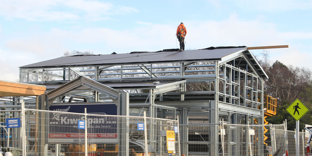 A new shop being built in Christchurch. A lift in labour pay rates in Canterbury pushed up national figures released by Statistics NZ today. Photo / Geoff Sloan