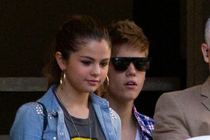 Selena Gomez with Justin Bieber in Auckland earlier this year. Photo / AP