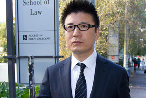 William Yan became a citizen at a VIP ceremony at Parliament. Photo / Brett Phibbs