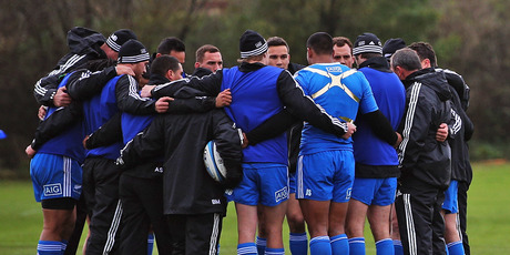 The All Blacks backs gather during a training session at Peffermill University in Edinburgh. Photo / Getty Images