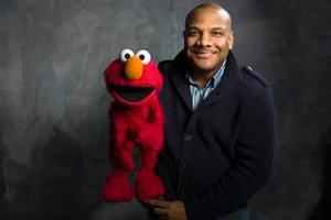 Muppet Elmo and puppeteer Kevin Clash. Photo / AP