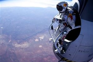 Felix Baumgartner prepares to jump during the first manned test flight for Red Bull Stratos. Photo / AP