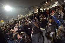 Couples kiss during a rally calling for the legalization of gay marriage in Paris. Photo / AFP