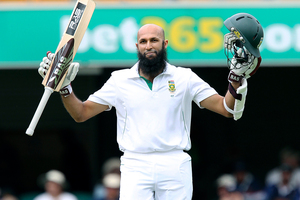 South Africa's Hashim Amla reaches his century during day three of the first cricket test between Australia and South Africa. Photo / AP