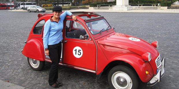 The often-photographed tour guide Marie and her 2CV in the Place du Trocadero. Photo / Rob McFarland