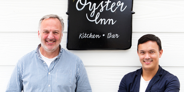 Jonathan Rutherfurd-Best and Andrew Glenn outside The Oyster Inn on Waiheke Island. Photo / Babiche Martens