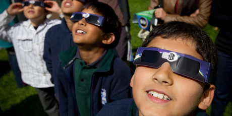 Nine-year-old Pranav Budhwar (right) and classmates were at Auckland's Stardome for the eclipse. Photo / Greg Bowker