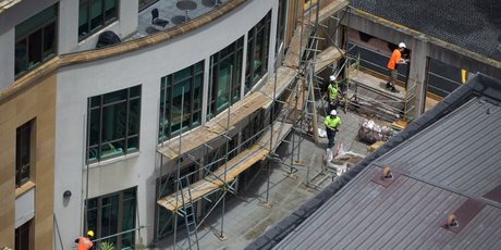 Contractors erect scaffolding at Chancery shopping centre in central Auckland in preparation for repair work. Photo / Sarah Ivey