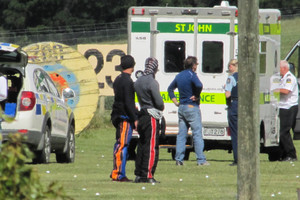 Emergency services attend the scene of a skydiver's fatal crash near Wanaka Airport yesterday. Photo / Otago Daily Times