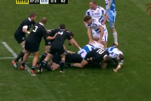 Stills from video of the Scotland v All Blacks test show Tamati Ellison (12) appearing to put a 'chicken wing' tackle on Ryan Grant. Photo / Supplied
