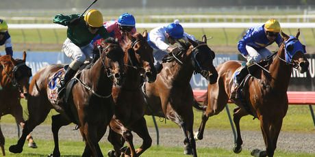 Nashville sweeps down the outside to win the Coupland's Mile at Riccarton yesterday. Photo / Getty Images