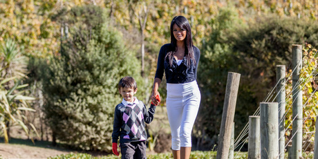 Celebrity chef Farah Quinn is here to showcase NZ to her 1.1 million Facebook friends and 343,000 Twitter followers. She's seen here with her son, Arman. Photo / Supplied