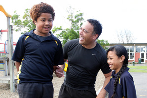 Tone Kolose with students Bronson Mokalei and Faustina Falauga. Photo / Doug Sherring