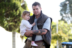 Builder Troy Jury works long hours to better support daughter Indi. Photo / Doug Sherring