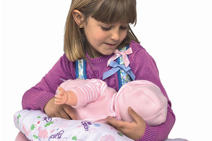 The Breast Milk Baby feeds like a real baby. Photo / AP