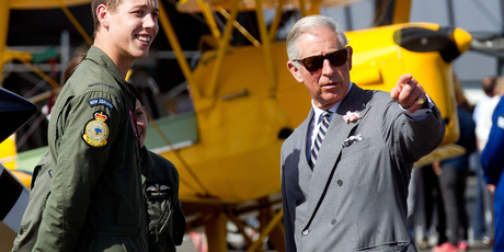 Prince Charles speaks to a Royal New Zealand Air Force staff member during a visit to RNZAF Base Ohakea today. Photo / Getty Images