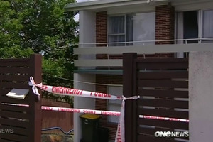 A house in Manurewa is searched by police after the fatal stabbing of Inayat Kawthar. Photo / One News