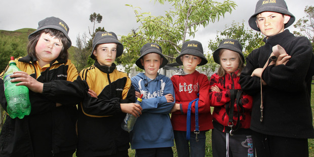 Six sad Kai Iwi School children and lamb minders who are now minus their little woolly mates. Photo / Bevan Conley