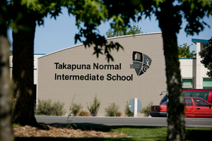 Takapuna Normal Intermediate School teachers last week suggested to students that they keep the hugs outside of the school day. Photo / Dean Purcell