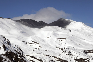 The blackened crater of Mt Ruapehu after it erupted in 2007. Photo / John Cowpland