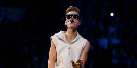 Justin Bieber has had a run in with police after making a dangerous turn in his supercar. Photo/AP