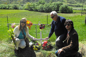 The family of accident victim Carolina Patron Costas, her mother Magdalena, father Jose and brother Jose jun, lay flowers at the scene of last week's fatal crash. Photo / Olivia Caldwell
