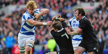 David Denton pushes aside Richie McCaw. Photo / Getty Images