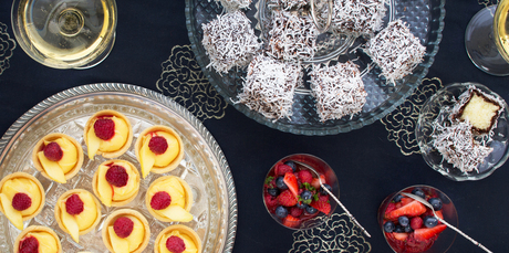 (From top) Chocolate lamingtons; fresh berry cups with Pimms and lime curd tarlets with mango and raspberries. Photo / Babiche Martens