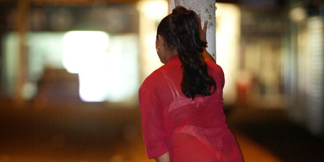 A transgender prostitute looks for work near the Hunters Corner area on a typical Thursday night in Papatoetoe. Photo / Greg Bowker