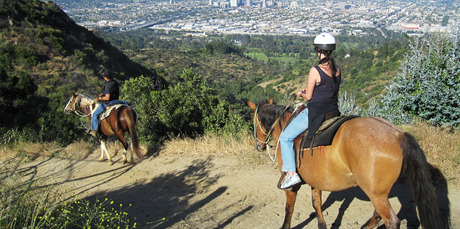 A guided horse ride at Sunset Ranch takes you through one of the largest urban parks in the US. Photo / Rob McFarland