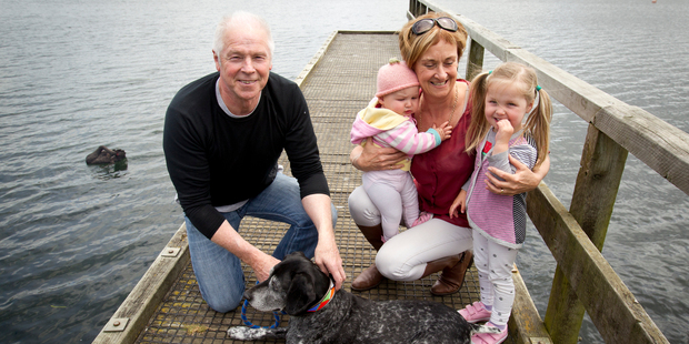 Pete Taylor and his wife Faith with their two grandchildren Tilly Hughes, eight months, and Kaitlin Hughes, 3. Photo / Dean Purcell