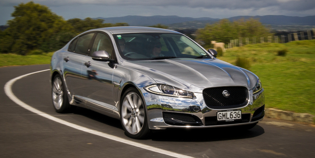 The Jaguar XF, which took more than 50 hours to "wrap", has certainly grabbed people's attention since it hit the roads in Auckland. Photo / Ted Baghurst