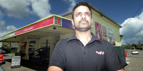 Vinod Meghwal, manager of the St John Four Square Supermarket, was still shaken yesterday after the armed holdup. Photo / Stuart Munro