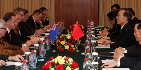 New Zealand Prime Minister John Key and his delegation meet with Chinese Premier, Wen Jiabao, and a large Chinese delegation before the Gala Dinner at the 21st ASEAN Summit. Photo / Alan Gibson