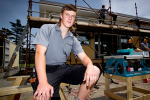Carpentry student Jay Leech is one of the 88 students enrolled at the Auckland West Vocational Academy, at Massey High School. Photo / Dean Purcell