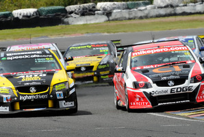 Greg Murphy and Scott McLaughlin do battle in the New Zealand V8 SuperTourers. Photo / Geoff Ridder