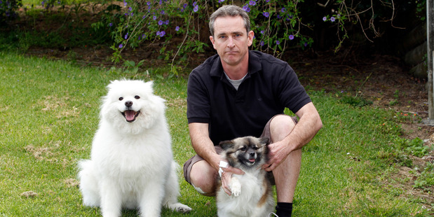 Jared Dacre rescued a woman and these two dogs, Bella and Batty, from the burning house. Photo / Michael Craig