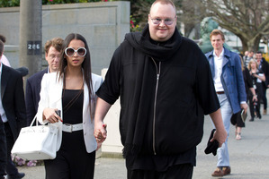 Internet billionaire Kim Dotcom and his wife Mona leaving after attending question time in parliament.Photo / File