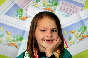 Zahnee Riley-Campbell, 7, whose debilitating facial tumour has been operated on in New York, hopes her book's sales will help raise money for other sick children. Photo / Alan Gibson