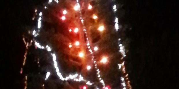 From a certain angle some believe an image of a mother and child can be seen in the community Christmas tree lights in Kaikohe. Photo / Supplied