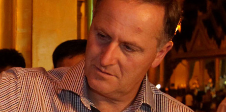 John Key shows off his cut forehead during a visit to the Shwedagon Pagoda in Yangon. Photo / Alan Gibson