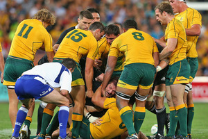 All Blacks captain Richie McCaw was kneed and headbutted by Wallabies flanker Scott Higginbotham during the Bledisloe Cup. Photo / Getty Images