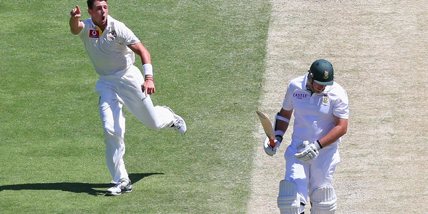 James Pattinson celebrates the wicket of Graeme Smith during the first test in Brisbane. Photo / Getty Images