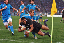 Julian Savea dives over to score for the All Blacks. Photo / Getty Images