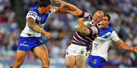 Sonny Bill Williams performs a shoulder charge tackle during his Bulldogs playing days. Photo / Getty Images